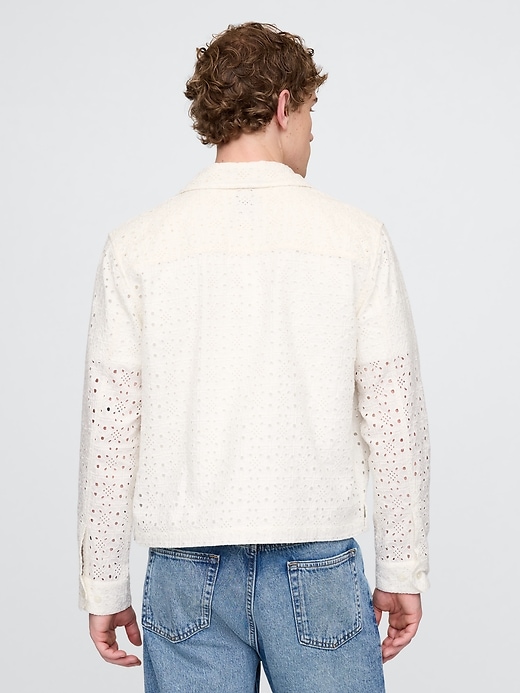 camicia con tasca e cerniera intera in popeline con occhielli