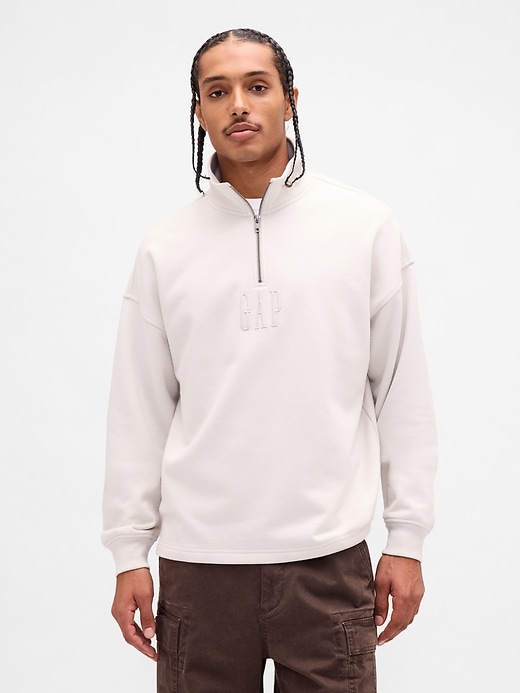 pullover pesante con mezza zip e logo oversize