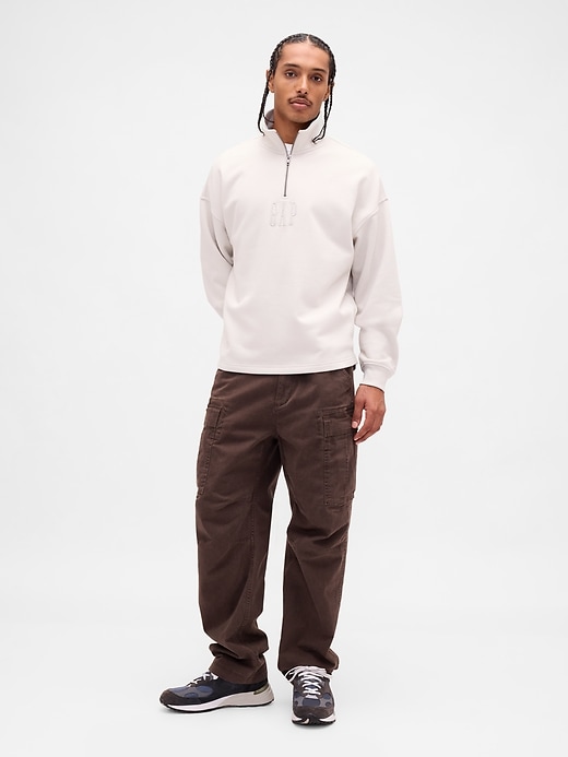 pullover pesante con mezza zip e logo oversize