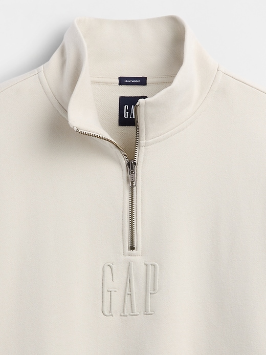 pullover pesante con mezza zip e logo oversize